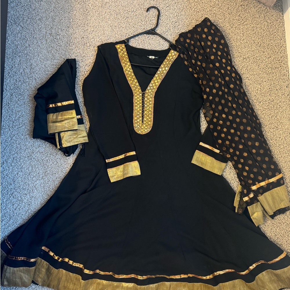 Chic Black Dress with Gold Accents